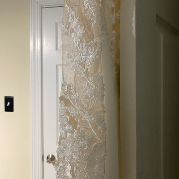 This is a beautiful Justin Alexander wedding dress that is ready for the taking! - Picture 7 of 13